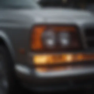 Close-up of a headlight before and after polishing, showcasing clarity improvement