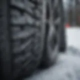 Close-up of winter tire tread pattern showing snow traction