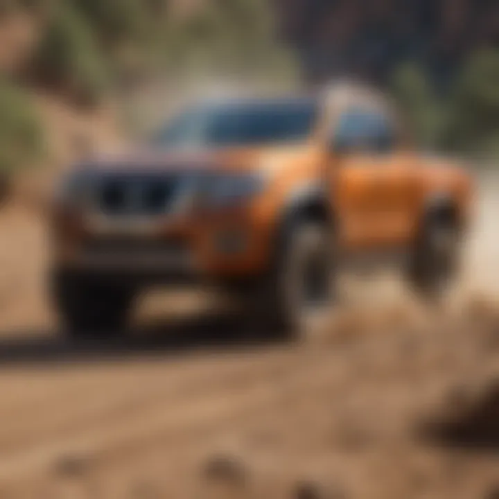 Action shot of the 2016 Nissan XD Diesel in a rugged off-road environment