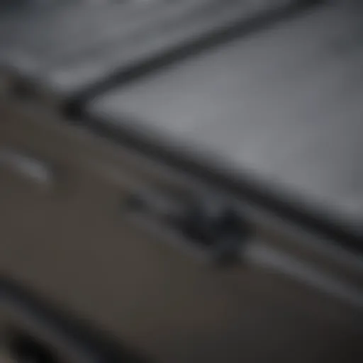 Close-up of a hard folding tonneau cover on an F150 truck showcasing the locking mechanism