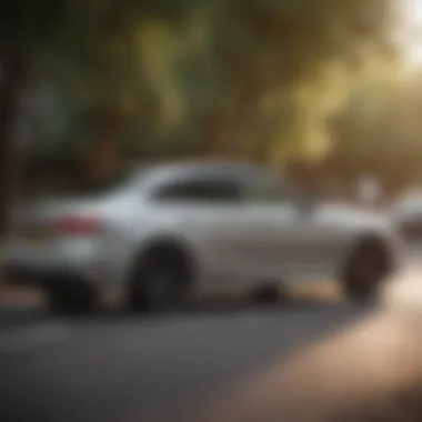 Side profile of a sporty manual car on a scenic road