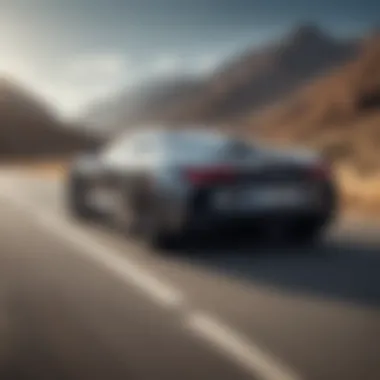 A high-performance luxury car accelerating on an open road