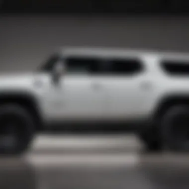 Side profile of the 2023 GMC Hummer EV SUV highlighting its sleek contours and electric features