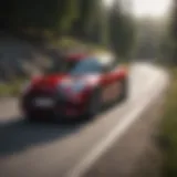 Dynamic view of Mini Cooper JCW driving on a winding road