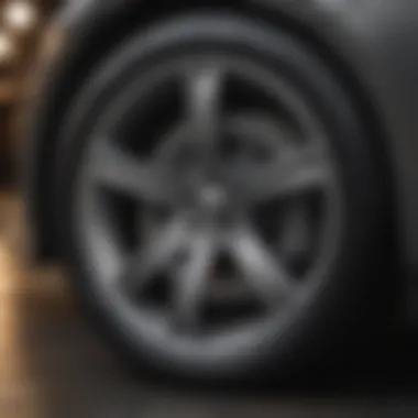 Close-up of the Corolla AWD Turbo's distinctive alloy wheels and tire design.