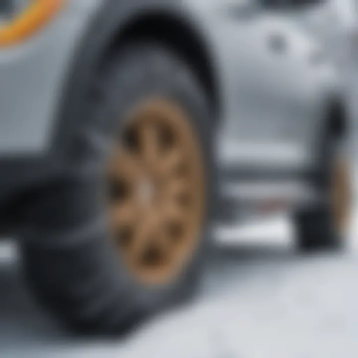 Installation of tire chains on a vehicle in a snow-covered environment demonstrating ease of use.