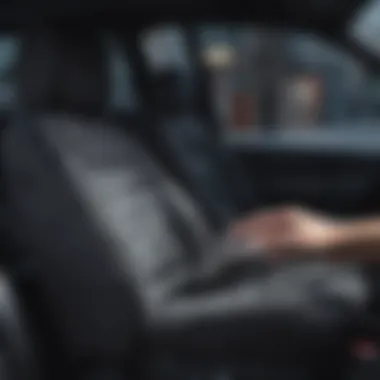 User applying maintenance products to a clear plastic fitted car seat cover.