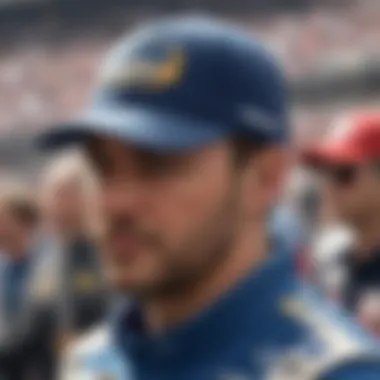 A NASCAR fan enthusiastically wearing a team hat at a race event