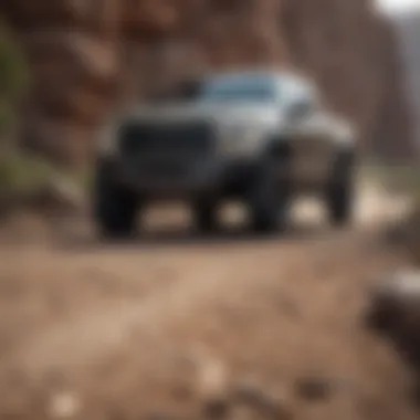 Ford Raptor in Rugged Terrain Scenic view of Ford Raptor driving through rugged terrain