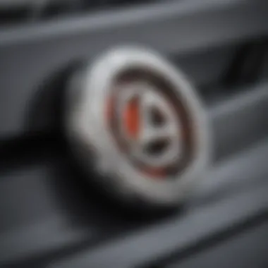 Close-up of a turbo badge on a car hood