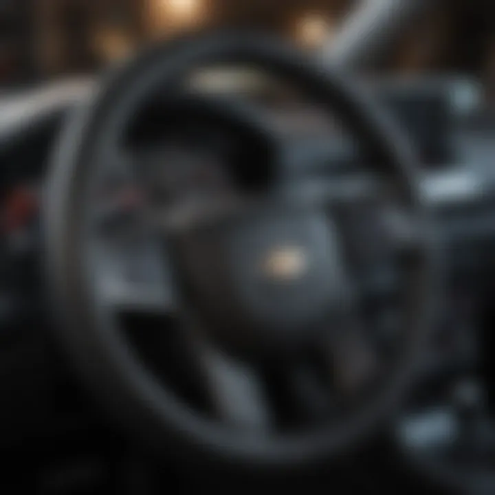 A stylish black Chevy steering wheel cover fitted on a steering wheel.