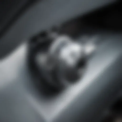 A close-up view of a catalytic converter security lock installed on a vehicle.