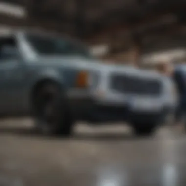 Mechanic inspecting a car with high mileage during a routine checkup