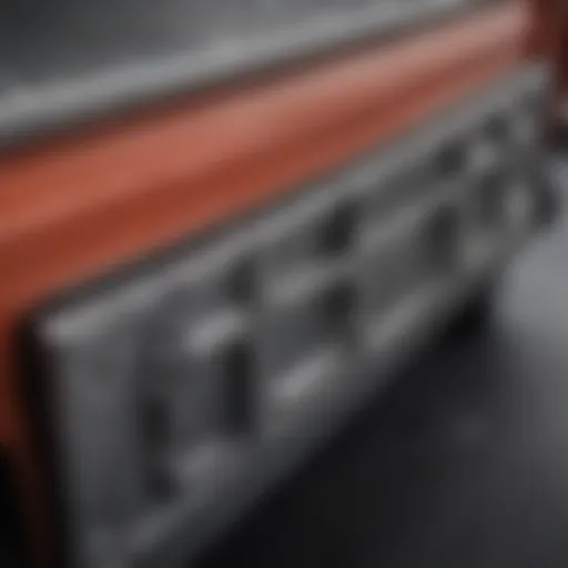 A detailed view of a truck toolbox secured with tie downs