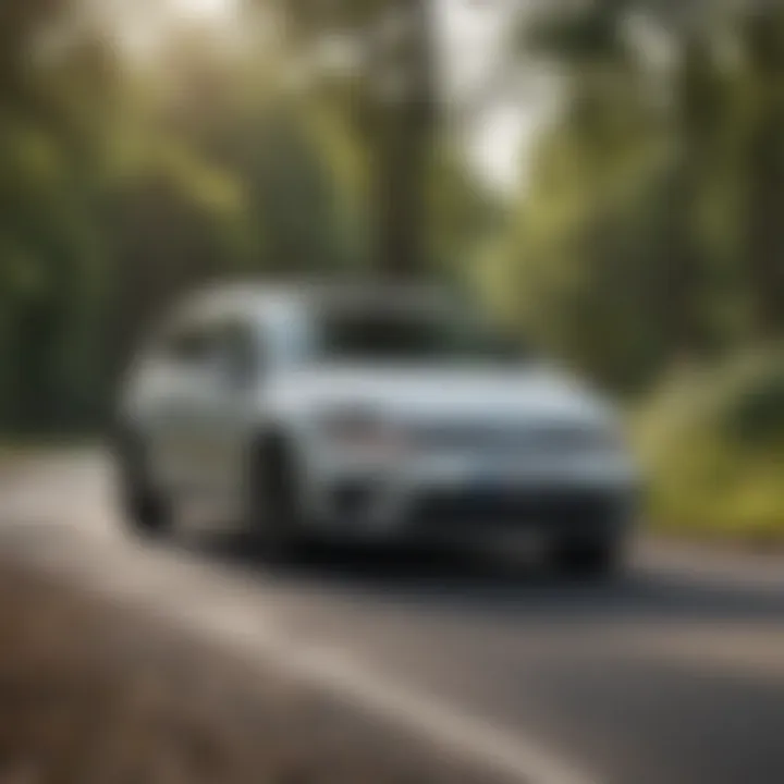 Volkswagen Golf TDI in motion on a scenic road, illustrating performance dynamics